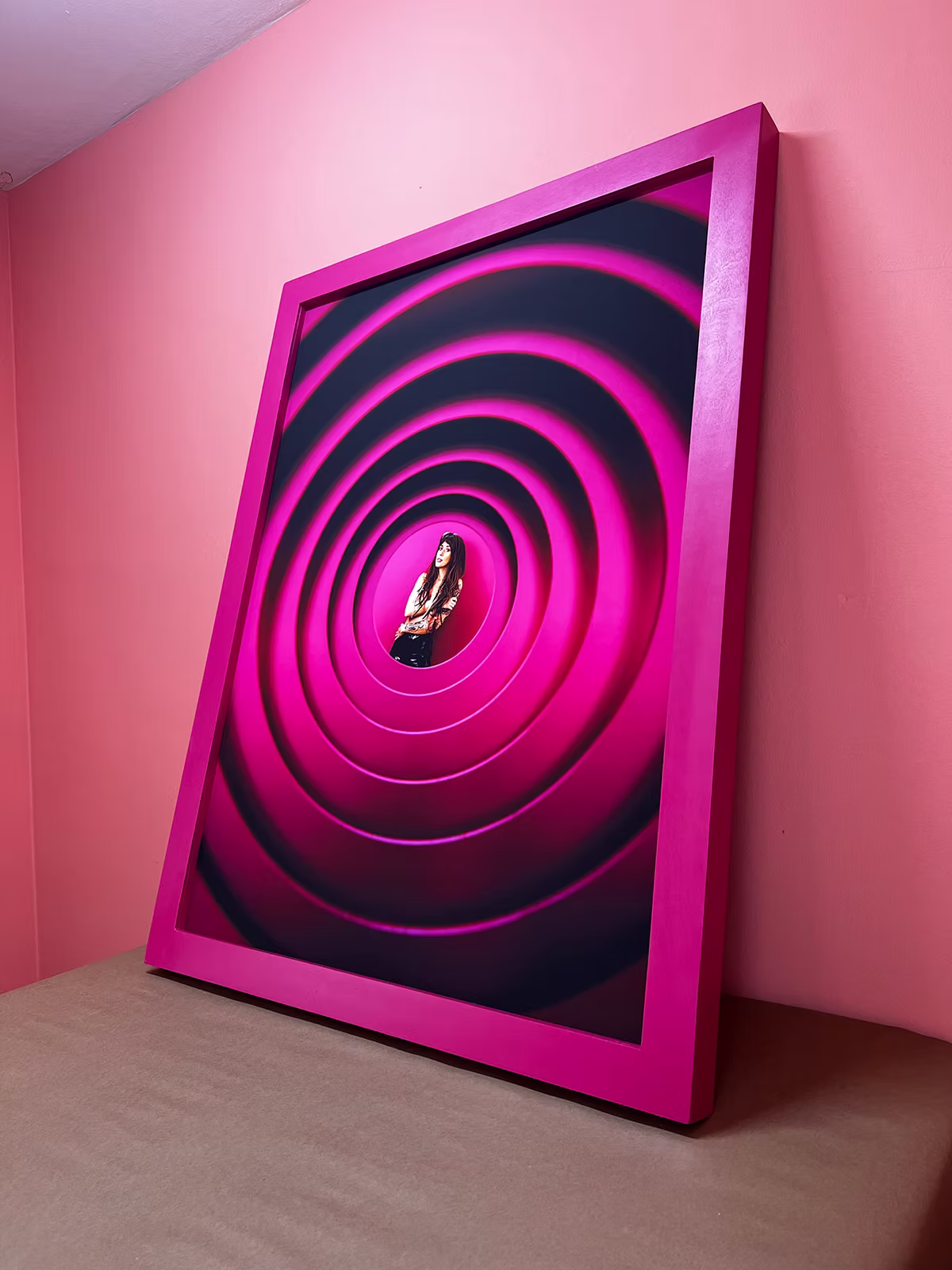 person-at-center-of-fuschia-concentric-circles.jpg