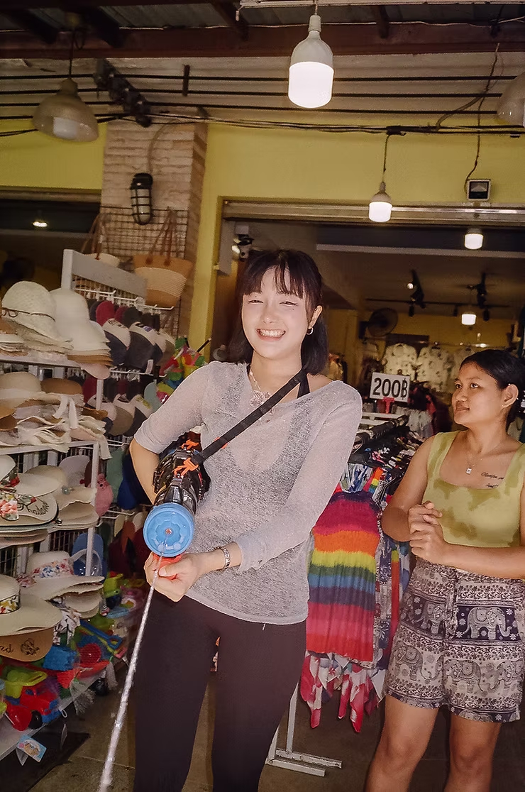 woman-with-toy-water-gun.jpg