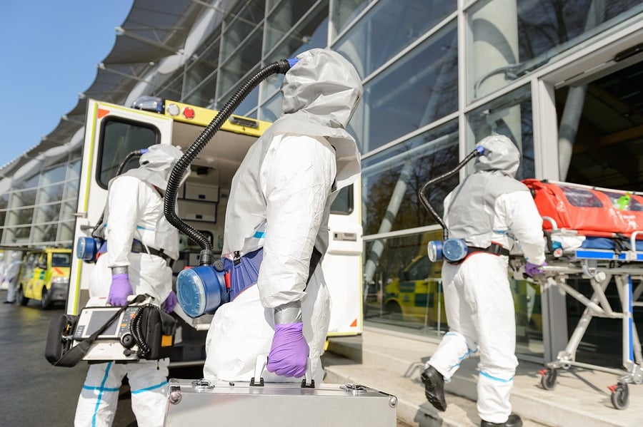 bigstock-HAZMAT-team-with-stretcher-and-65375563.jpg