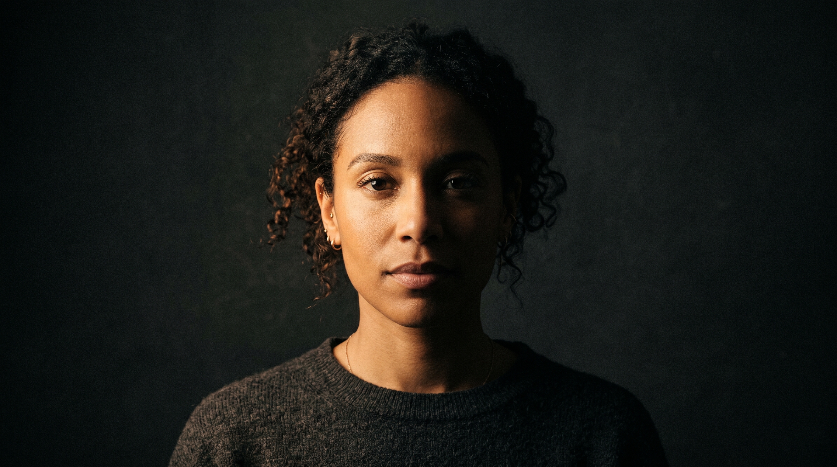 Example of split lighting on a portrait, with one half of the face brightly lit and the other in deep shadow