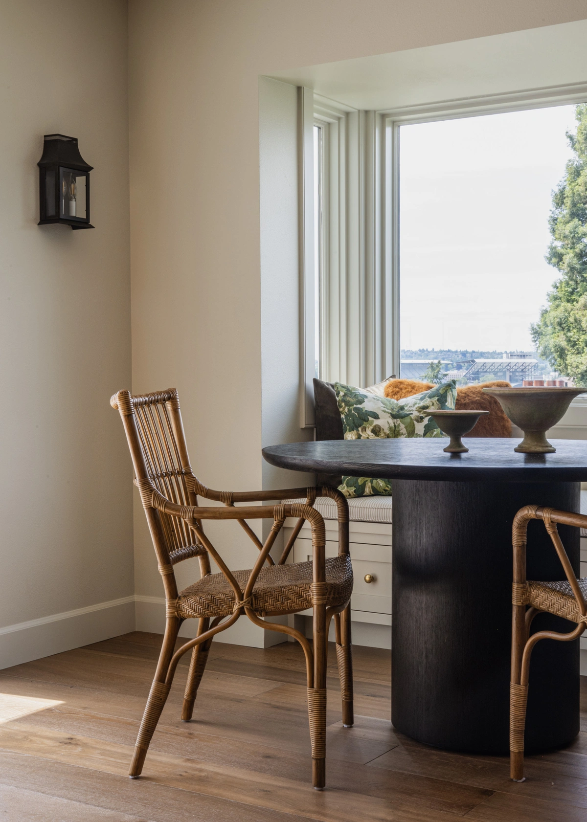 Inviting Dining Nook with Rattan Accents - View 2