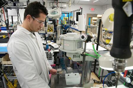 Technician working with Gems sensor equipment.