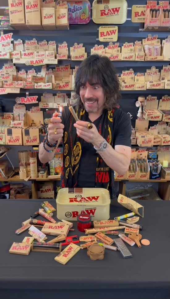 Image of Josh Kesselman surrounded by RAW products Image of Josh Kesselman surrounded by RAW products